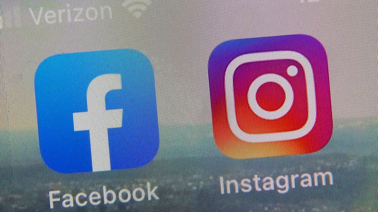 Facebook and Instagram applications seen on a phone.