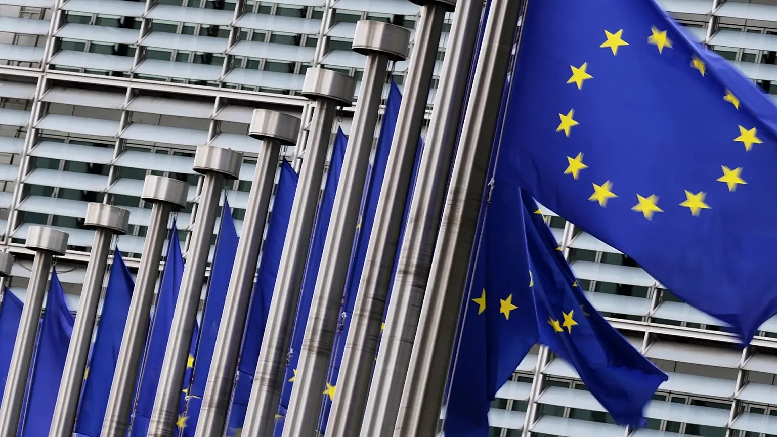 European Union flags flap in the wind outside EU headquarters in Brussels, 3 September, 2025