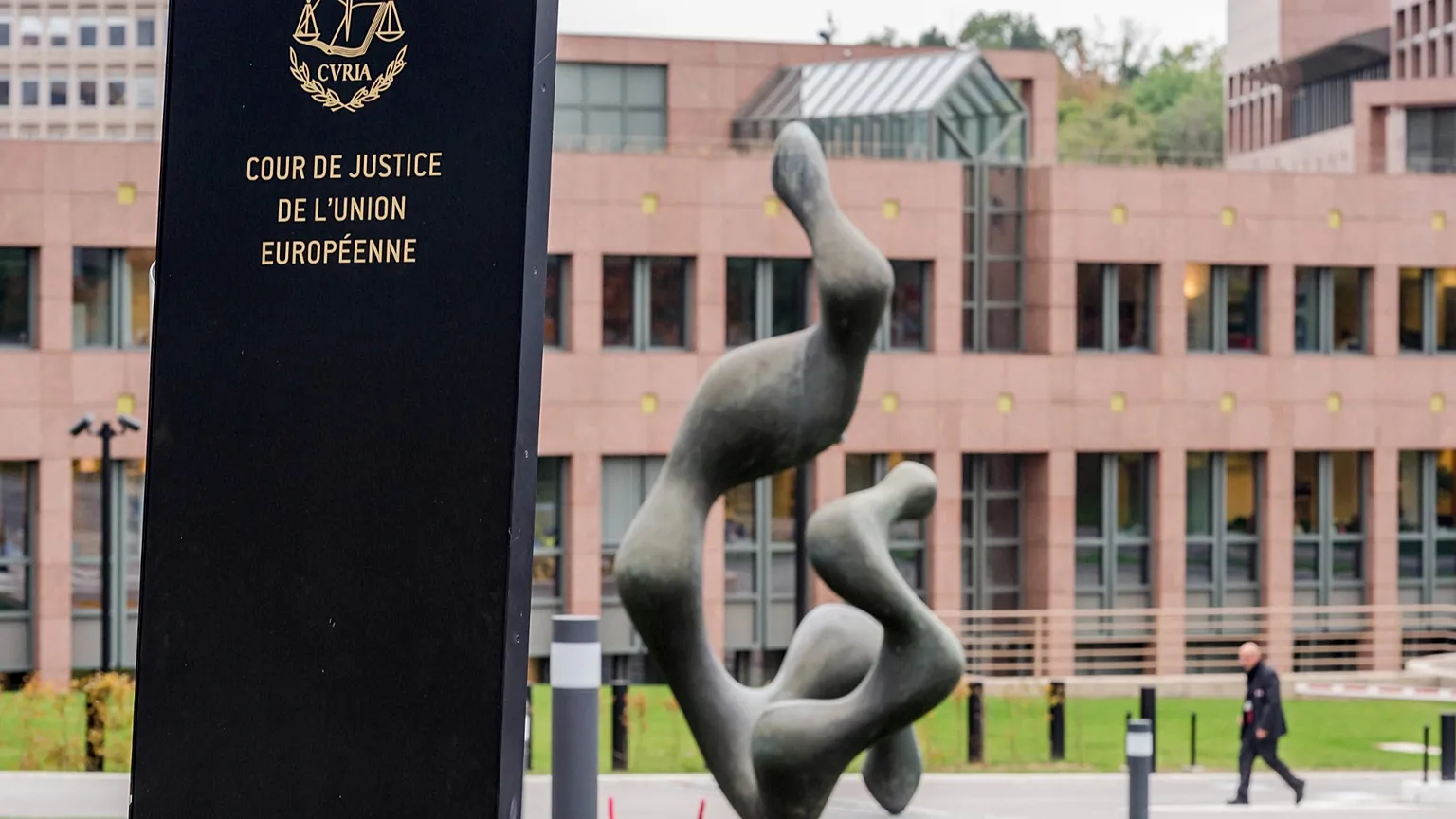 FILE: A man walks by the European Court of Justice in Luxembourg, 5 October 2015