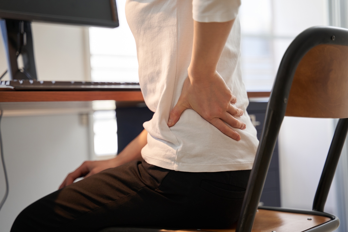 Una mujer con dolor de