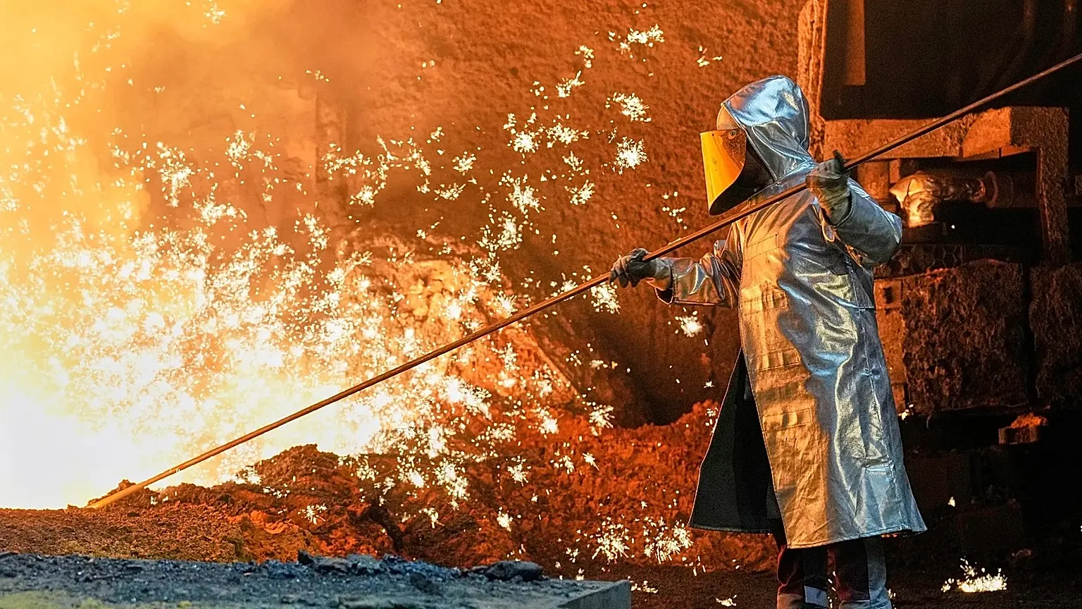A man works at the thyssenkrupp steel mill in Duisburg, Germany, Wednesday, Nov. 5, 2025.