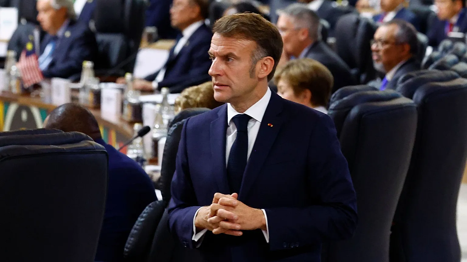 France's President Emmanuel Macron attends a plenary session on the opening day of the G20 Summit at the Nasrec Expo Centre, in Johannesburg, South Africa, 22 November.