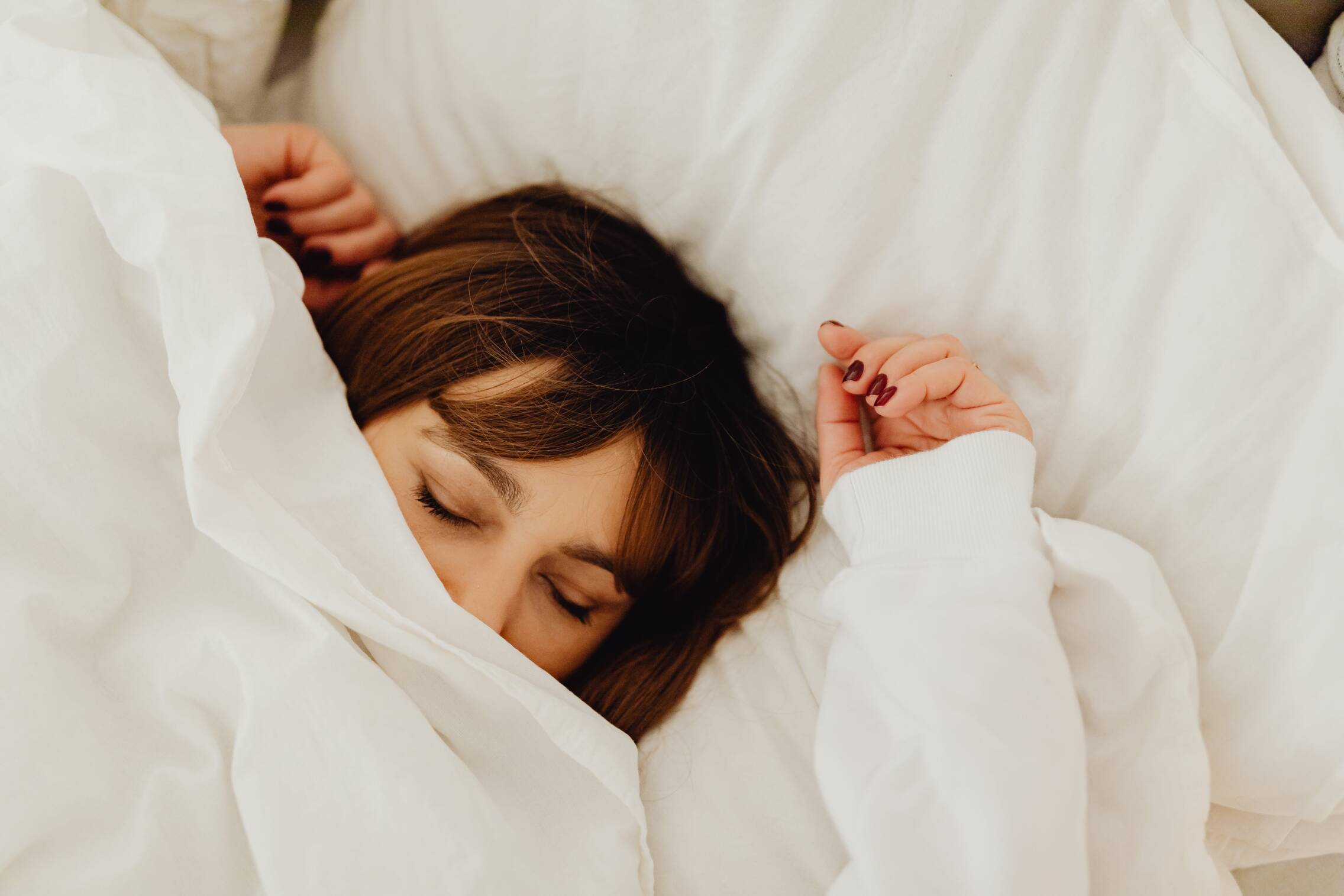 Foto: Imagen de archivo de una persona durmiendo. (Pexels)