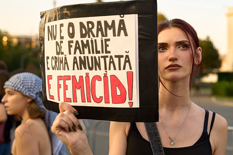 'It's not family drama, it's predictable death", reads a banner in a Bucharest protest in June 2025, following the killing of a pregnant mother of two