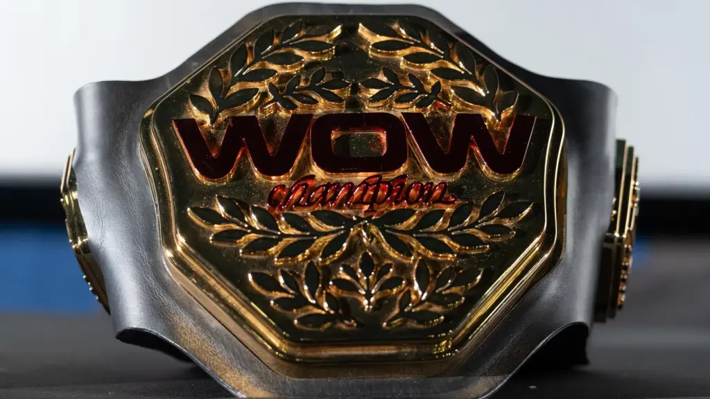 Uno de los cinturones de campeón de WOW