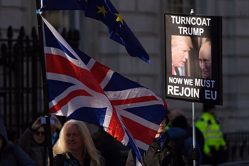 Ukrainian and Anti-Brexit supporters outside Downing Street with flags and placards as Prime Minister Keir Starmer holds a Ukraine Summit in London, 2 March 2025