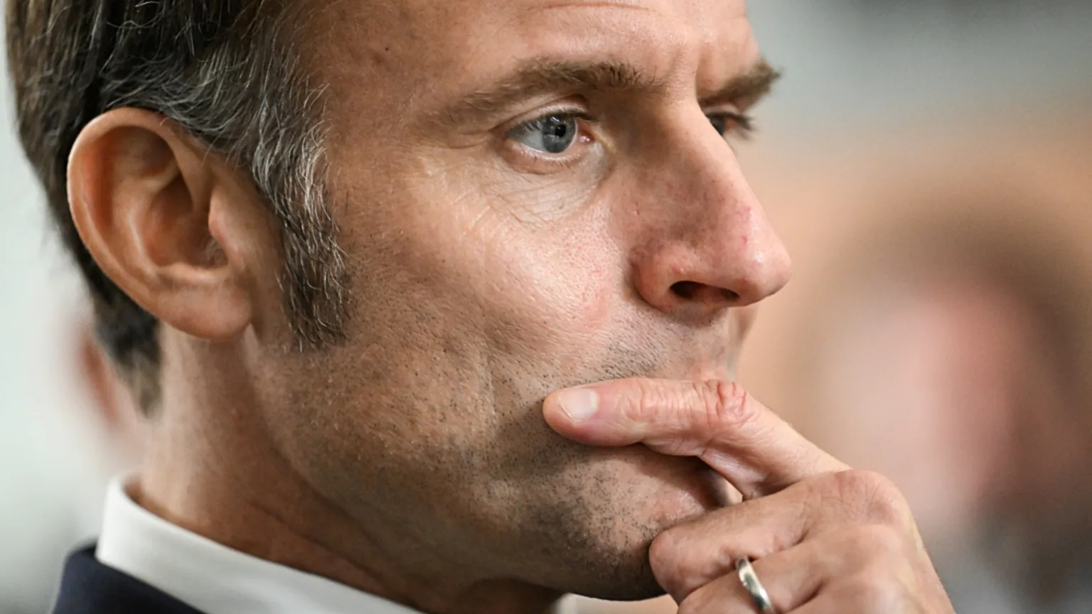 France's President Emmanuel Macron reacts as he listening during the inauguration of a new police station in Marseille, southern France, 16 December 2025.
