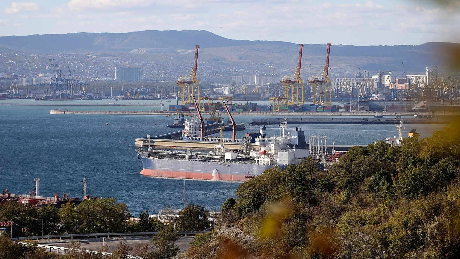 A Russian oil tanker moored at the Black Sea port of Novorossiysk, where one of the two ships that caught fire in Turkish waters on Friday was headed 