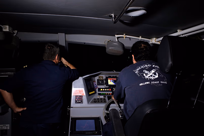 Greek coast guards operate during a sea operation near the port of Mytilene on the Greek island of Lesvos in 2015.