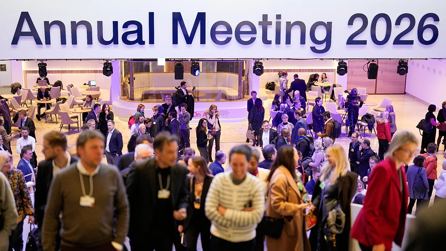 People leave on the final day of the Annual Meeting of the World Economic Forum, Switzerland.