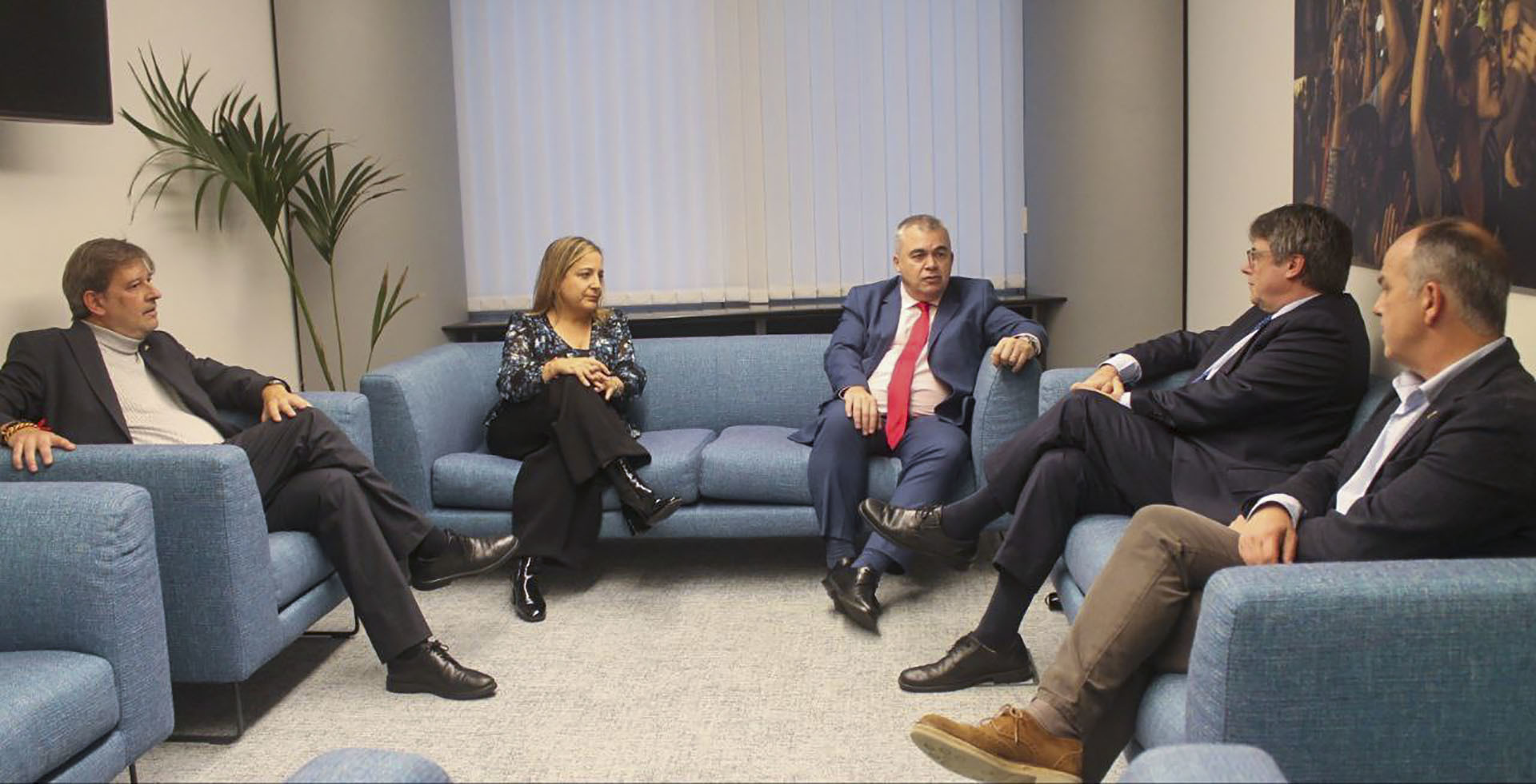 Santos Cerdán con Carles Puigdemont y Jordi Turull en Bélgica en octubre de 2023