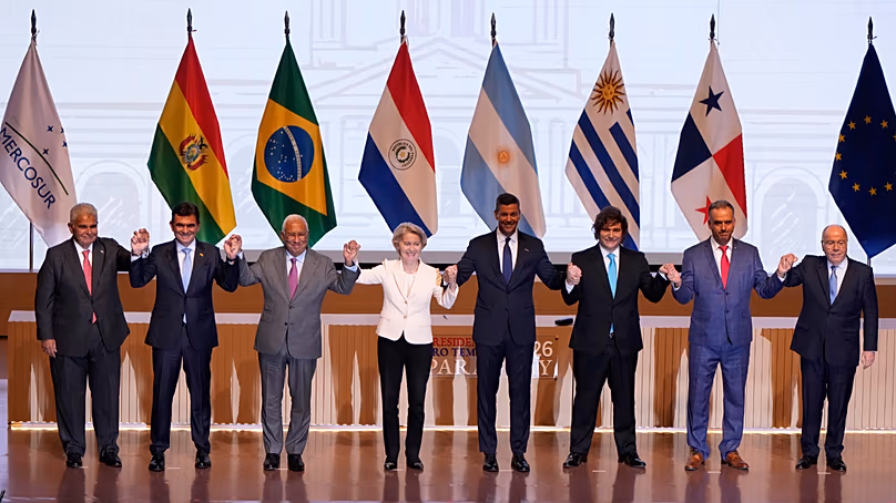Mercosur leaders, European Council President and European Commission President. (AP Photo/Jorge Saenz)