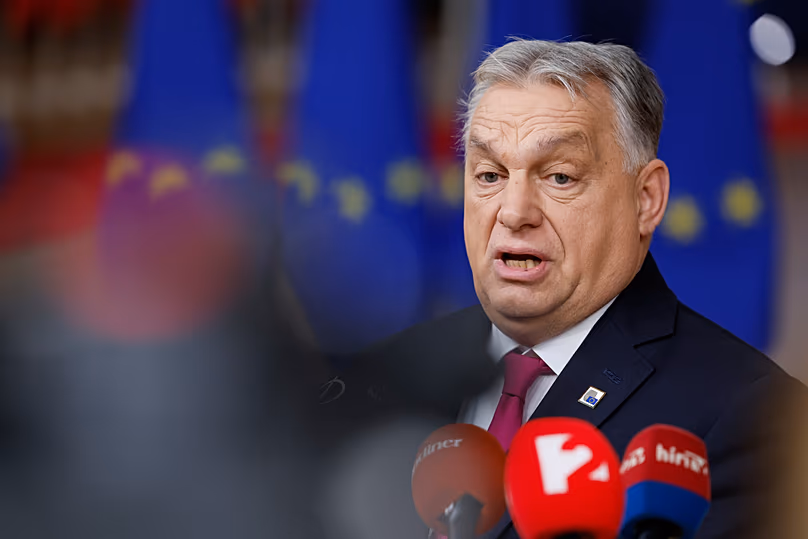 Hungary's Prime Minister Viktor Orbán speaks with the media as he arrives for the EU Summit in Brussels, 18 December, 2025