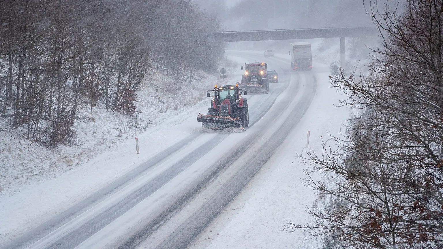 A snow plough cleans the road during a heavy snowfall in Viborg, central Jutland, Denmark, Wednesday Jan. 3, 2024.Temperatures have fallen below minus 40 degrees Celsius in t