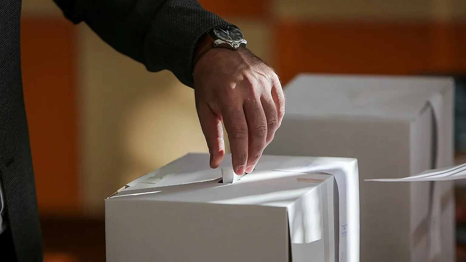 A voter casts his ballot in the town of Bankya, Bulgaria, 02/10/2022