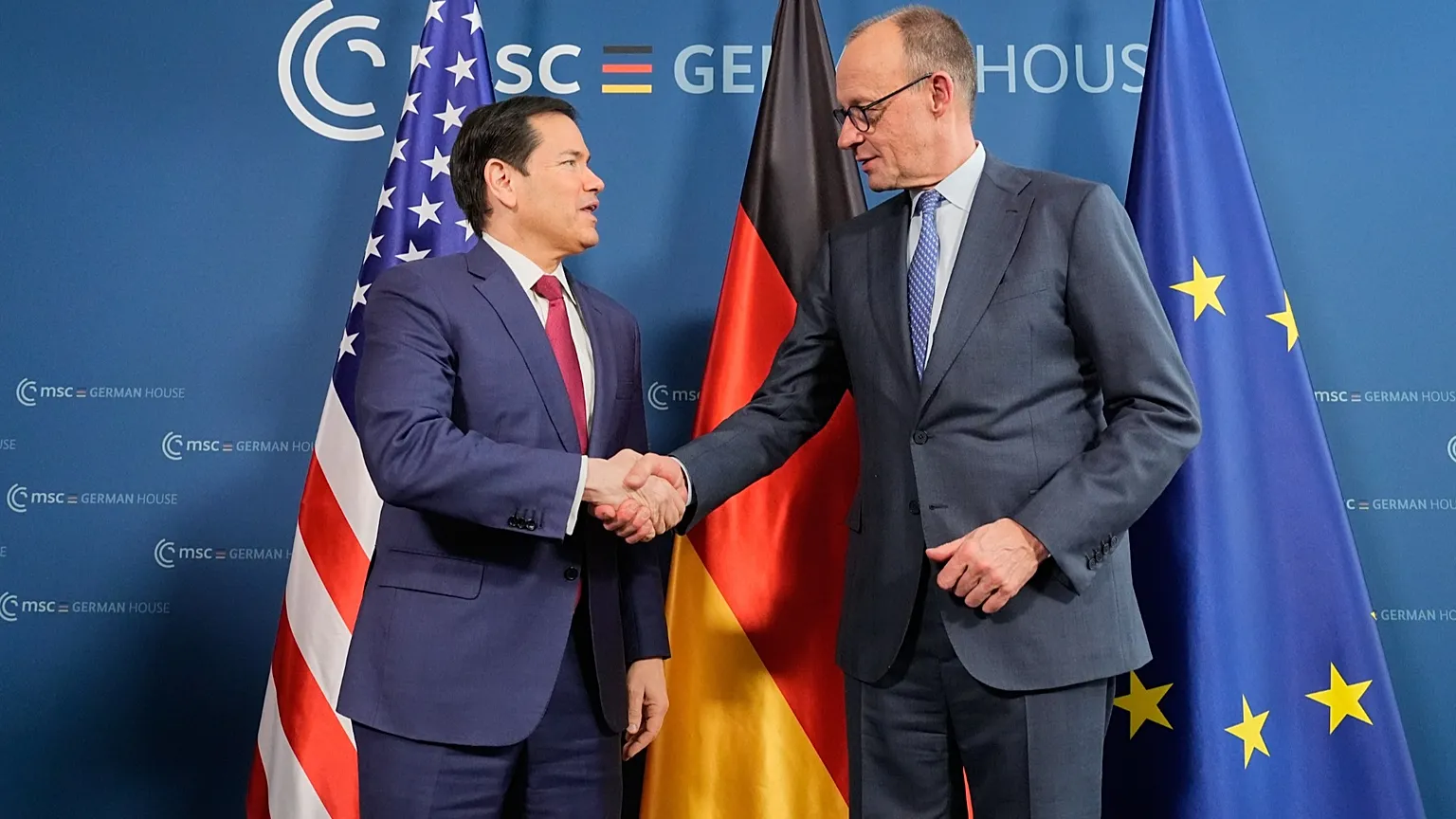 US Secretary of State Marco Rubio, left, and Germany's Chancellor Friedrich Merz meet on the sidelines of the Munich Security Conference, Germany, 13 Feb 2026,