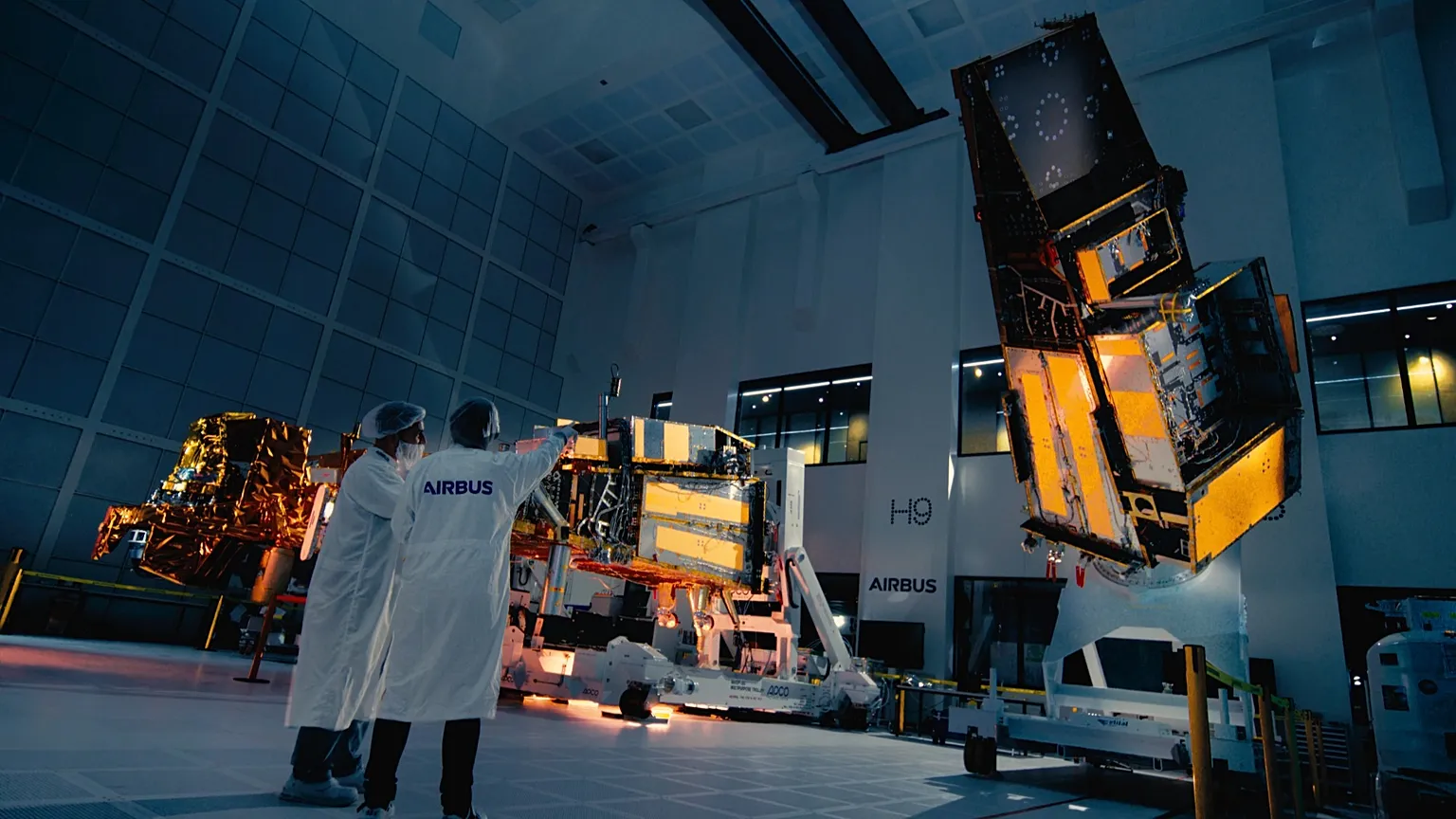 Three meteorological satellites in the cleanroom at Airbus' Friedrichshafen site, Germany, on 6 May 2025.