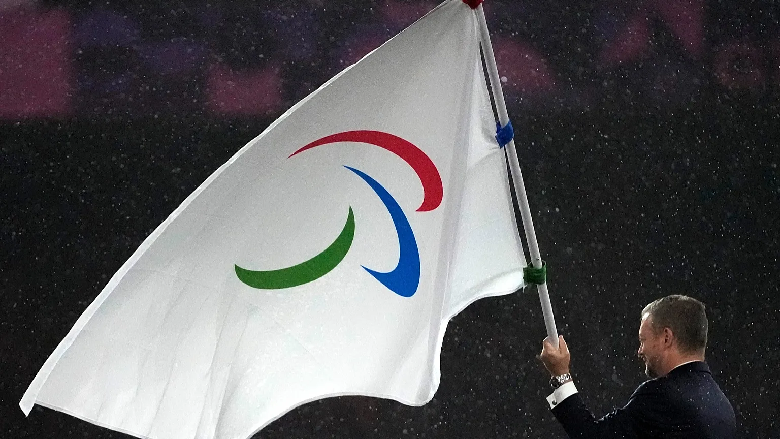 President of the International Paralympic Committee Andrew Parsons with the Paralympic flag in Paris Games in 2024