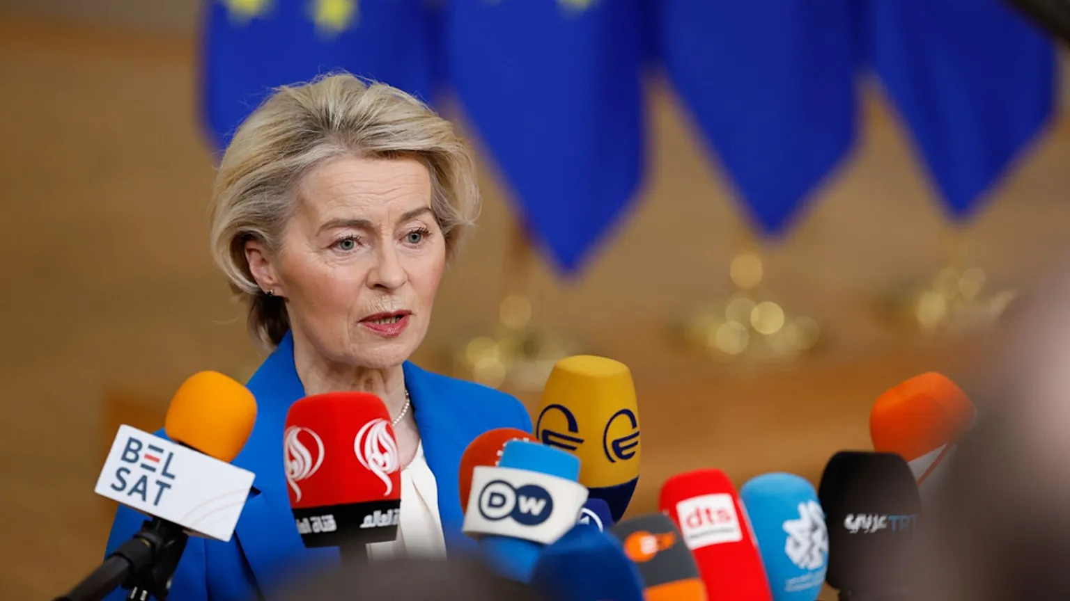 European Commission President Ursula von der Leyen speaks with the media as she arrives for the EU Summit in Brussels, 18 December 2025.