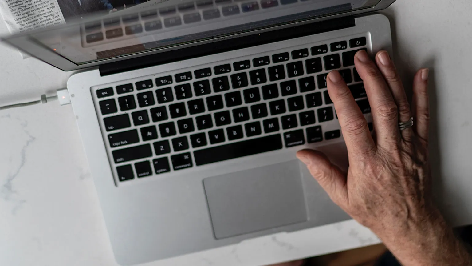 FILE - A person works on a laptop computer in Hudson, US, 16 November 2022.