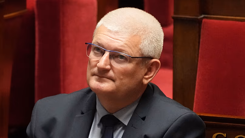 Olivier Falorni sits on the bench at the National Assembly. (AP Photo/Michel Euler)