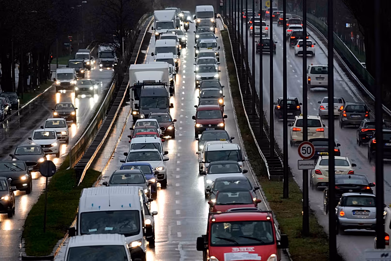 Cars and trucks are stuck in a traffic jam on a highway during a nationwide public transport strike in Munich, Germany, Monday, March 27, 2023.