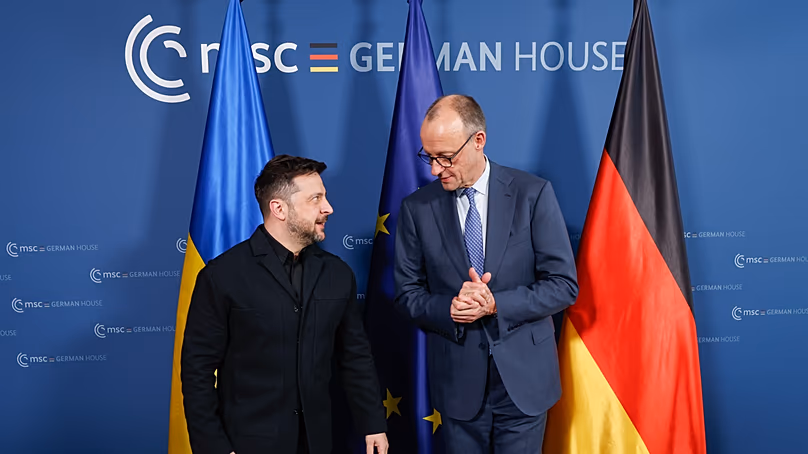 FILE - German Chancellor Friedrich Merz, right, meets Ukrainian President Volodymyr Zelensky during the Munich Security Conference in Munich, Germany, 13 February 2026.