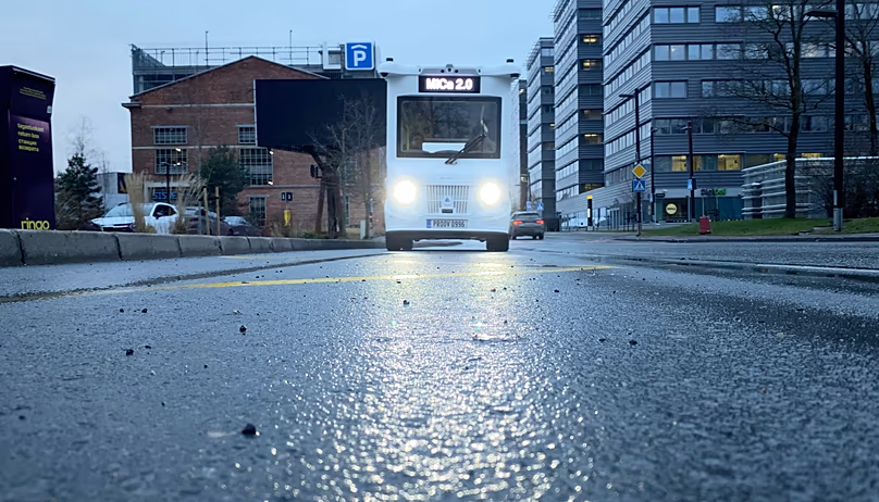 Self-driving electric shuttle bus on the streets of Tallinn, capital of Estonia