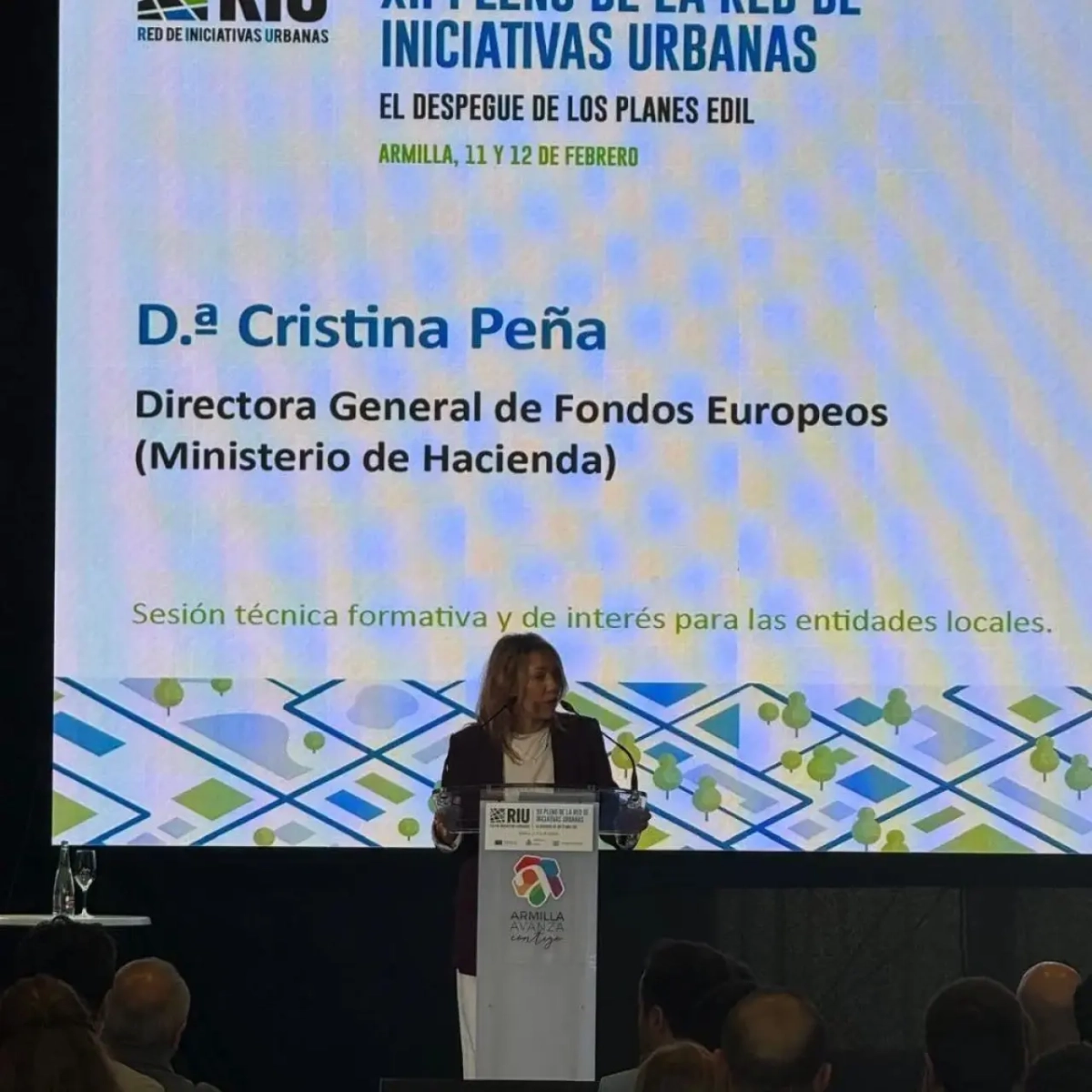 Cristina Peña, directora general de Fondos Europeos del Ministerio de Hacienda, interviniendo en el XII Pleno de la Red de Iniciativas Urbanas (RIU)