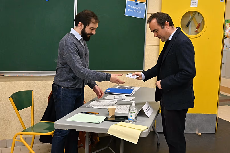 France's Prime Minister Sébastien Lecornu casts his vote during the first round of France's 2026 municipal elections in Vernon, 15 March, 2026