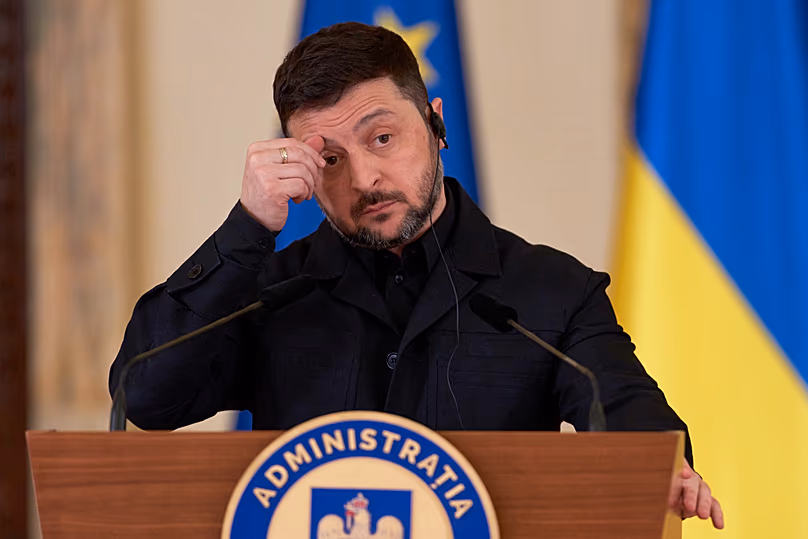 Ukrainian President Volodymyr Zelenskyy gestures during a news conference in Bucharest, 12 March, 2026