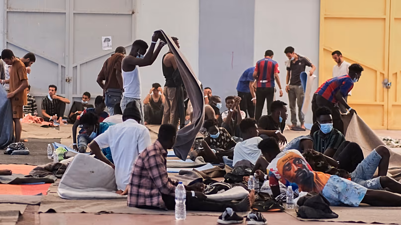 Migrants who arrived recently at the island of Crete, Aug. 19, 2025. (AP Photo/Giannis Angelakis)