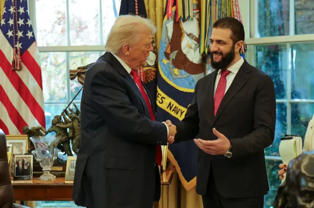Donald Trump y Ahmed al Shaara.