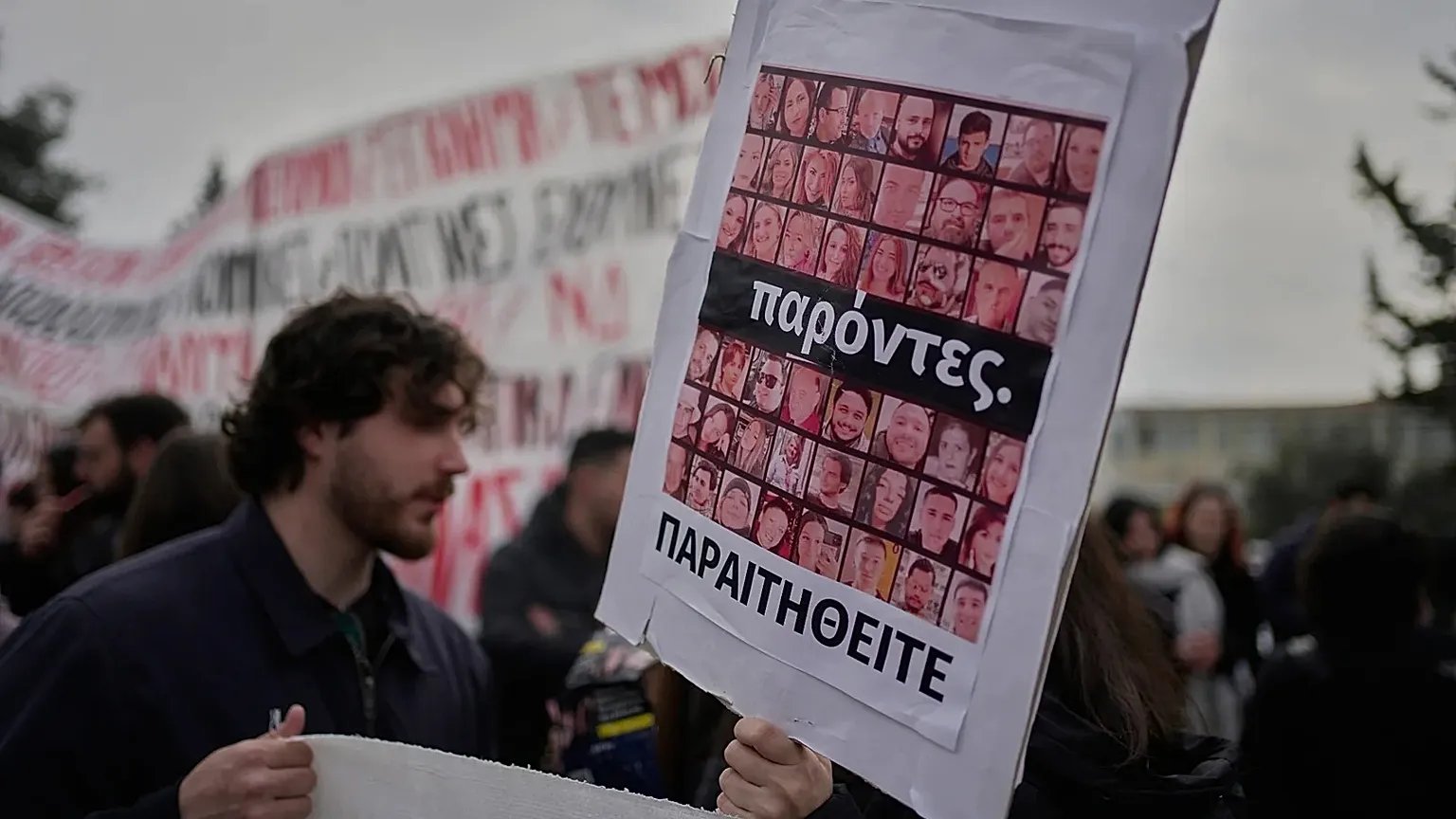 Protesters gathering outside the courthouse during the trial related to victims of the Tempi train crash in Larissa, 23 March, 2026