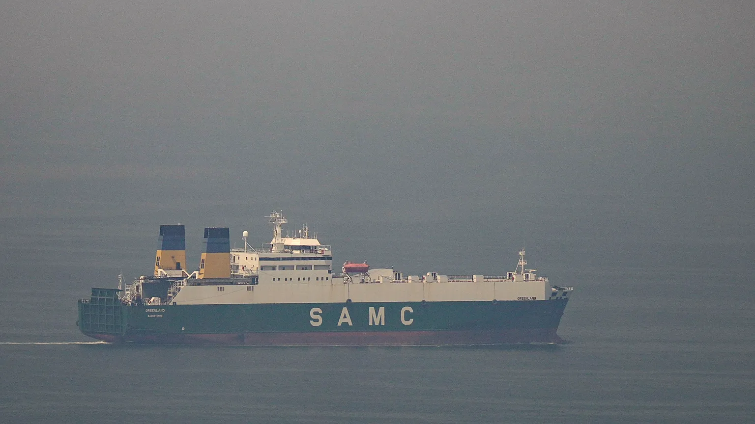 A cargo ship sails in the Arabian Gulf towards Strait of Hormuz in United Arab Emirates, Sunday, March 15, 2026. (AP Photo/Altaf Qadri)