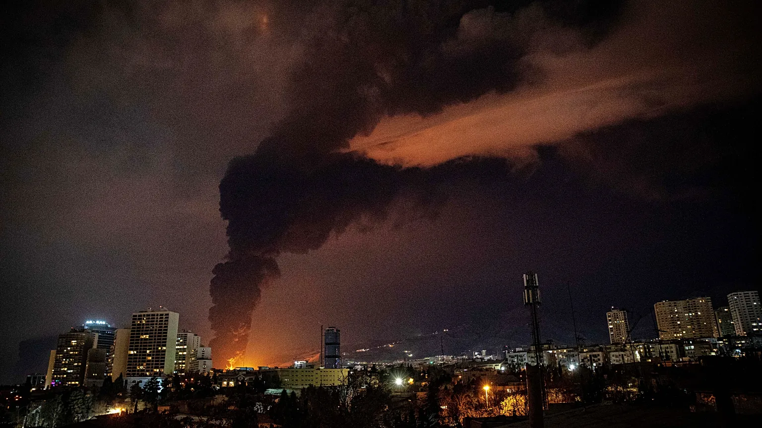 Flames rise from an explosion in Teheran.
