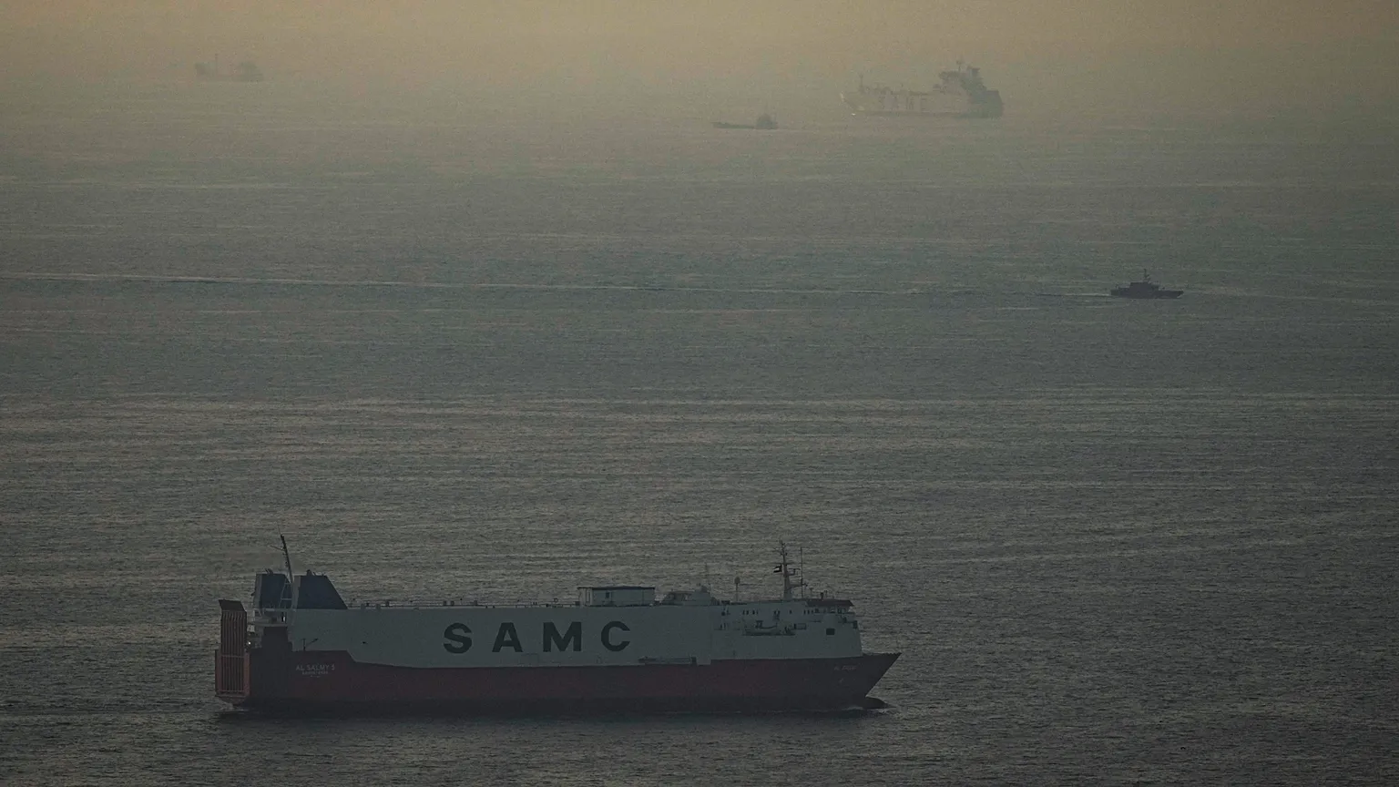Cargo ships sail in the Arabian Gulf towards Strait of Hormuz in United Arab Emirates, Thursday, March 19, 2026. 
