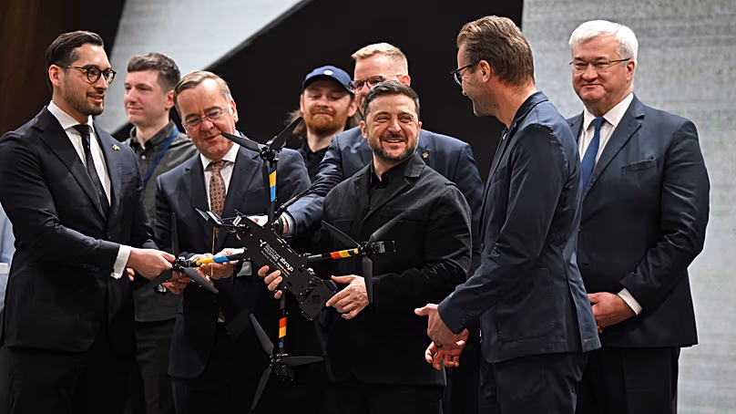 Ukrainian President Zelenskyy, German Defence Minister Pistorius, and Managing Director of Quantum Systems Florian Seibel at Quantum Frontline Industries near Munich, Germany,
