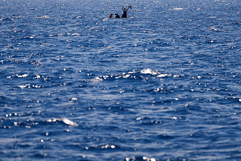 Migrants from Syria and Libya in a wooden boat call for help in the Mediterranean Sea, 10 August, 2022