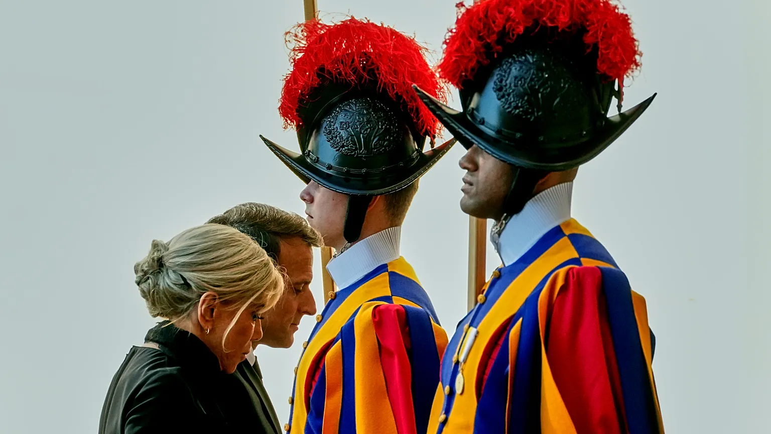 French President Emmanuel Macron and his wife Brigitte arrive in the St. Damasus Courtyard at the Vatican to meet with Pope Leo XIV, Friday 10 April 2026.