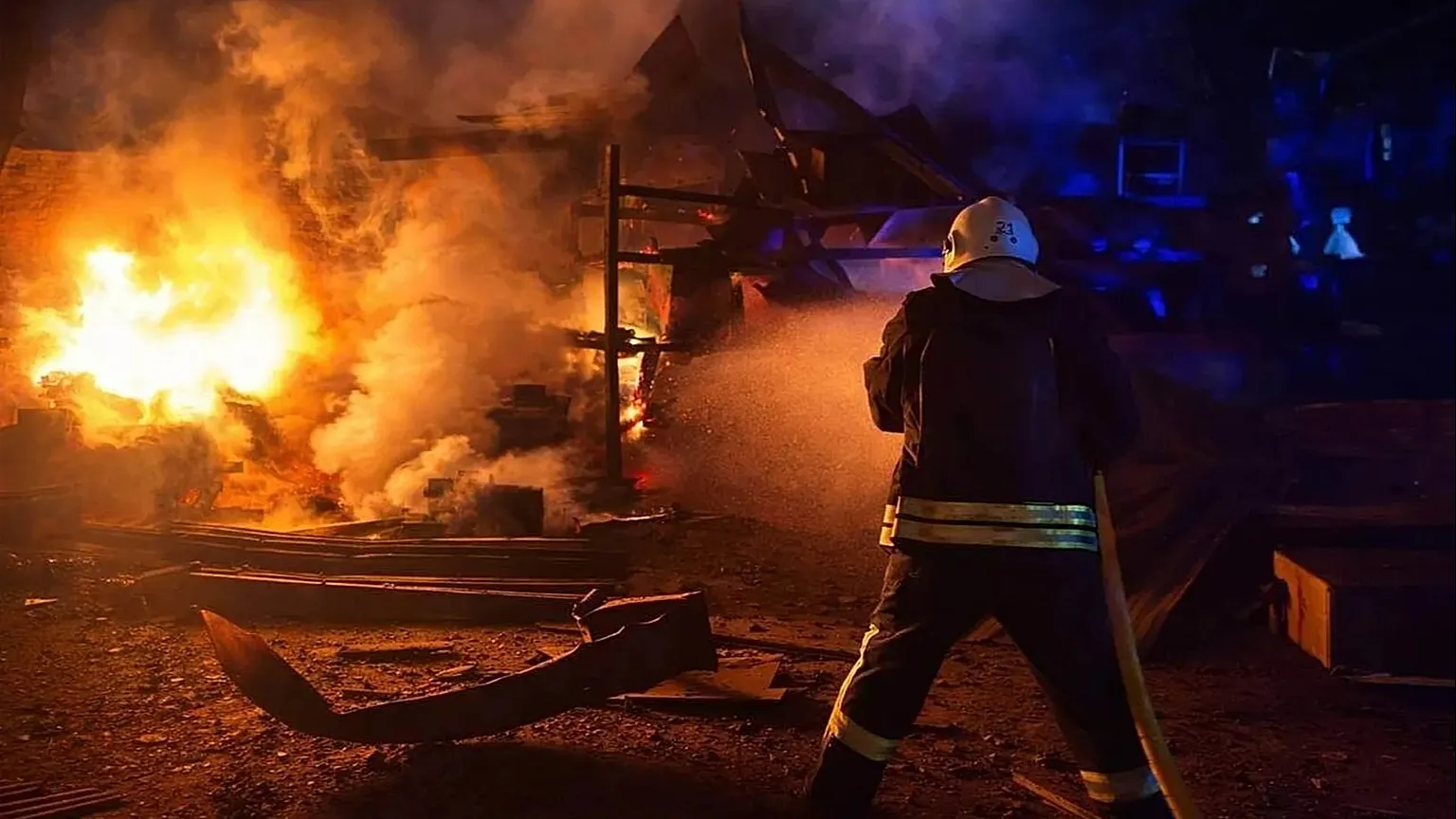 Rescue workers put out a fire after a Russian drone strike on Odesa region, 15 April, 2026
