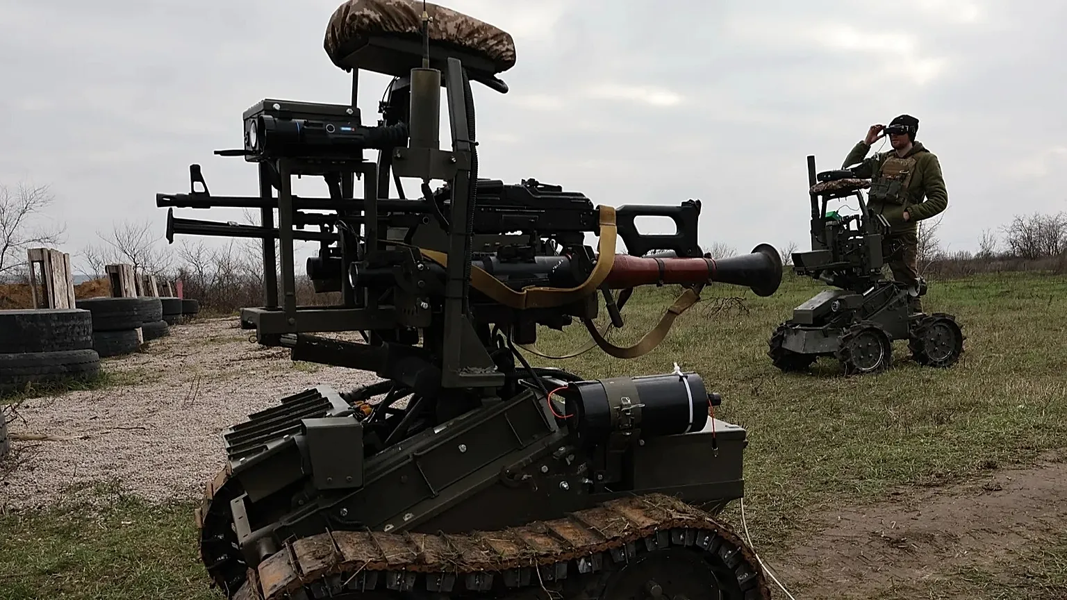 In this photo provided by Ukraine's 65th Mechanized Brigade press service, a soldier tests land drones in Zaporizhzhia region, Ukraine, Saturday, Dec. 6, 2025, 