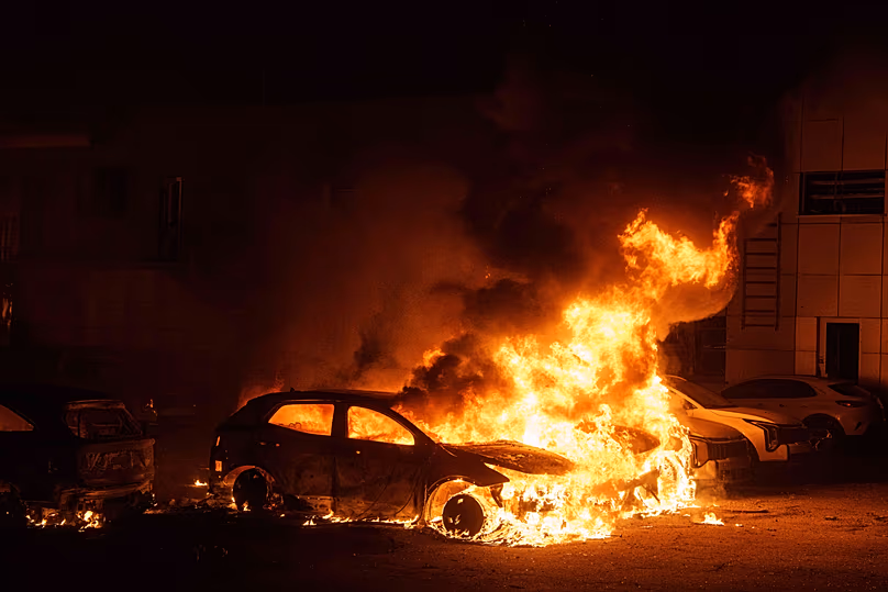 Cars burn after a Russian strike in Kyiv, Ukraine, on Thursday, April 16, 2026.