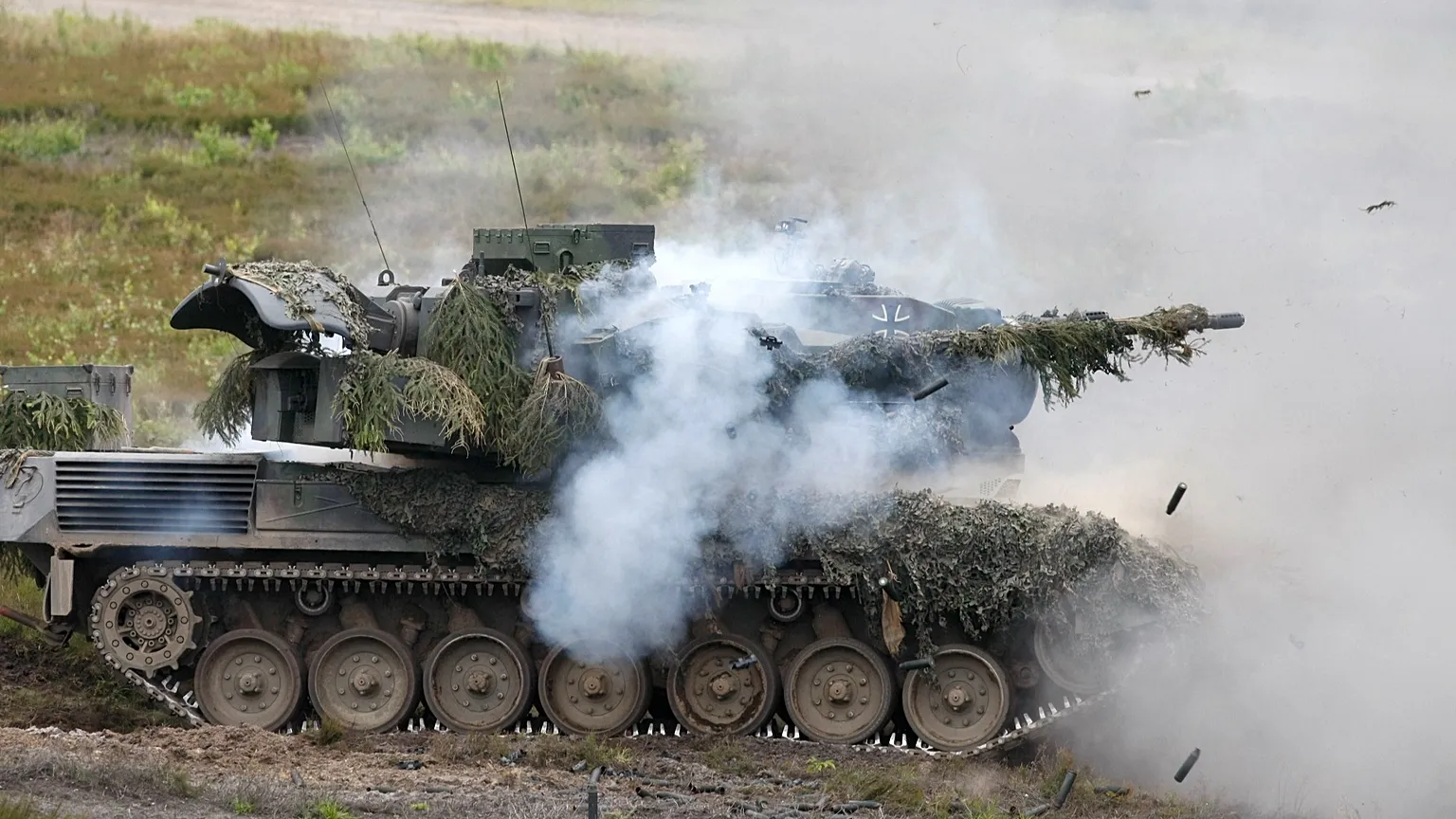 A "Gepard 1A2" anti-aircraft gun tank fires during a combat exercise at the military training area in Bergen, Lower Saxony, Germany, on Monday, 15 June 2009