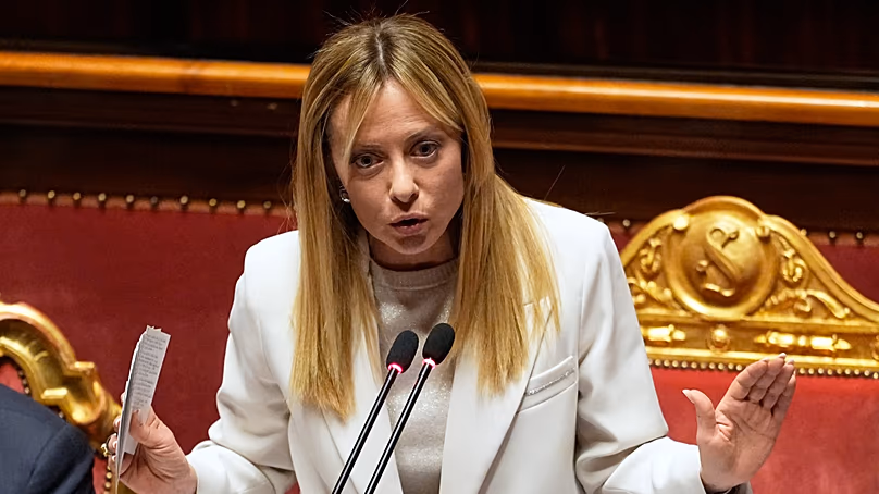 Italy's Prime Minister Giorgia Meloni addresses the Senate regarding the conflict in Iran and the Gulf region, in Rome, March 11, 2026. (AP Photo/Alessandra Tarantino)