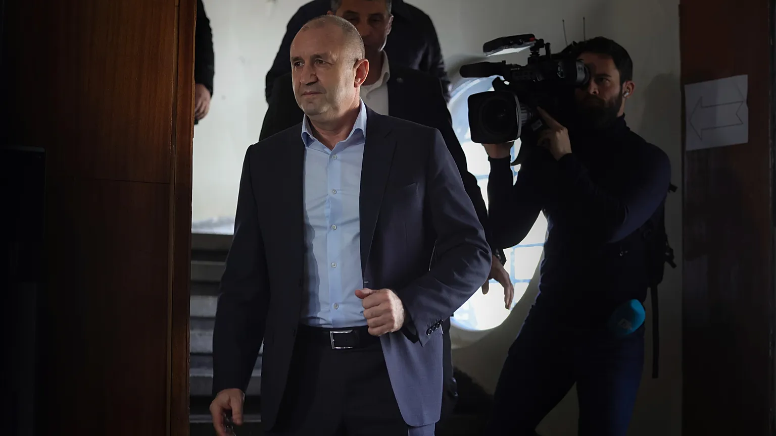 Bulgaria's President Rumen Radev leaves a polling station after casting his vote in Sofia, Sunday, April 2, 2023. (AP Photo/Valentina Petrova)