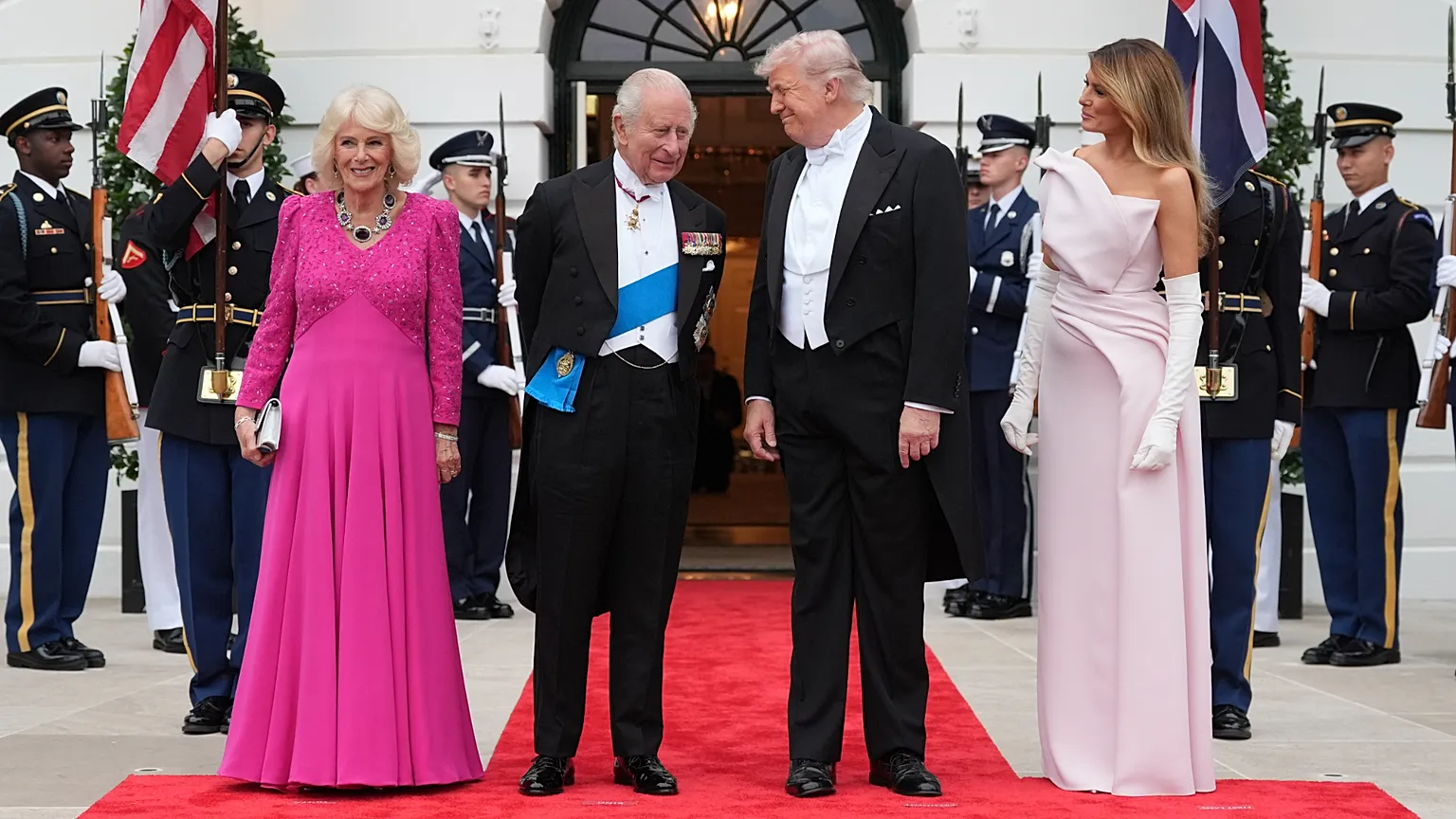 President Donald Trump and first lady Melania Trump greet King Charles III and Queen Camilla at the South Portico of the White House as they arrive for a State Dinner.