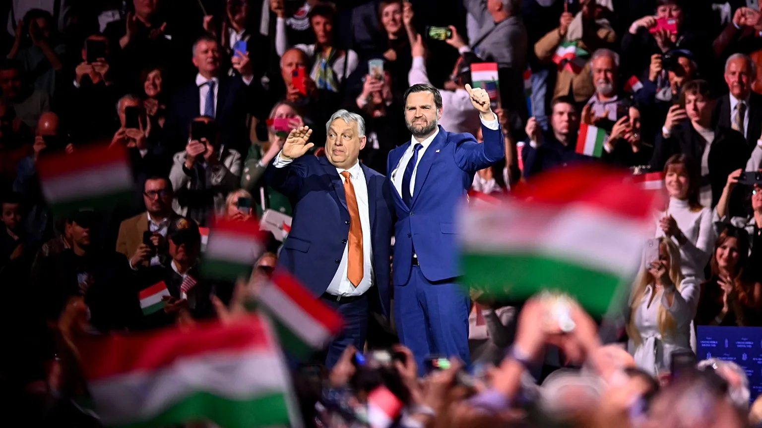 Hungary's Prime Minister Viktor Orban, left, and U.S. Vice President JD Vance gesture at the end of a pre-election rally in Budapest, Hungary, Tuesday, April 7, 2026.