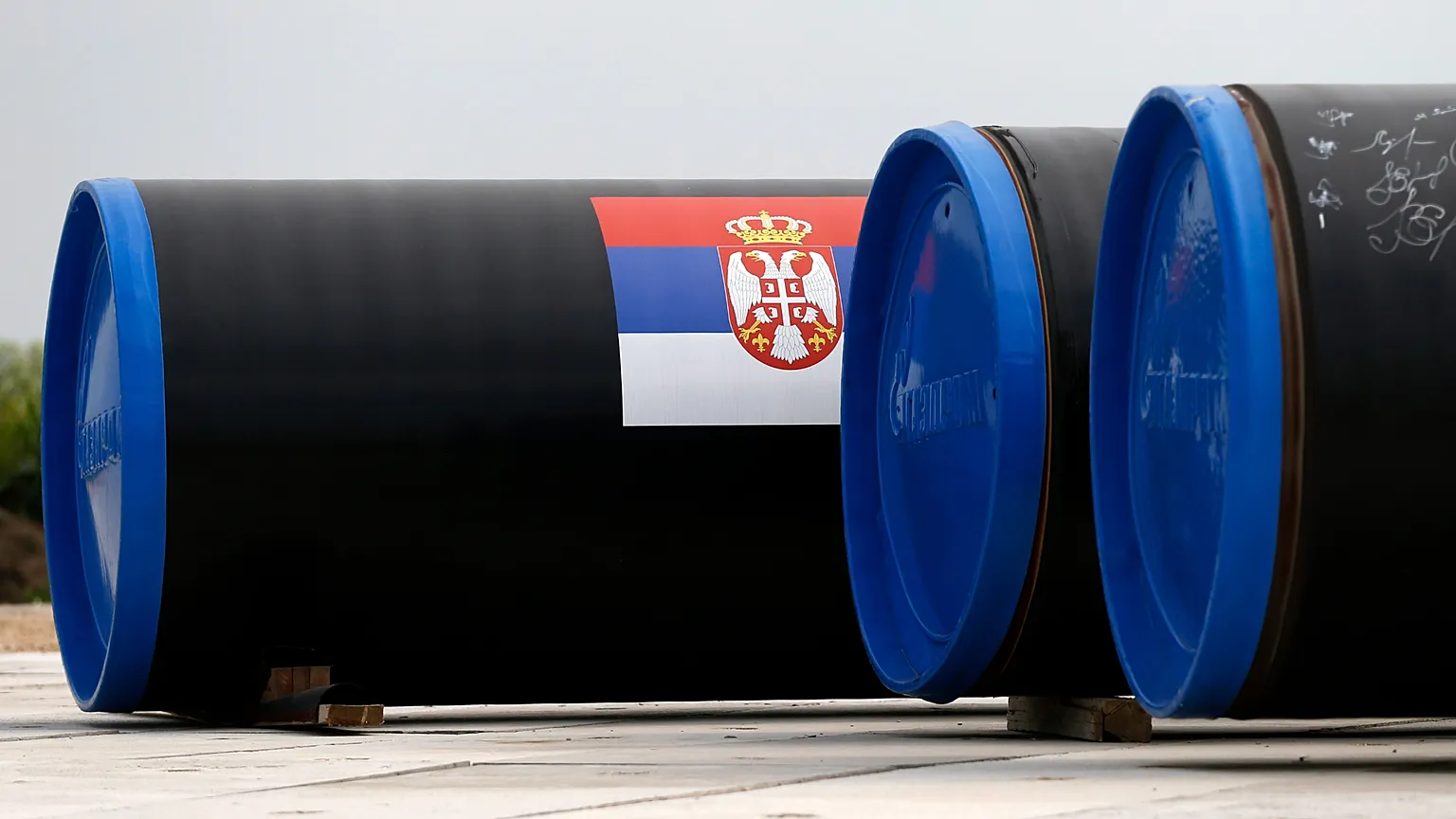 FILE PHOTO from 13 June 2014 showing a Serbian flag is seen on a gas pipe on the first section of the since-cancelled Gazprom South Stream natural gas pipeline.