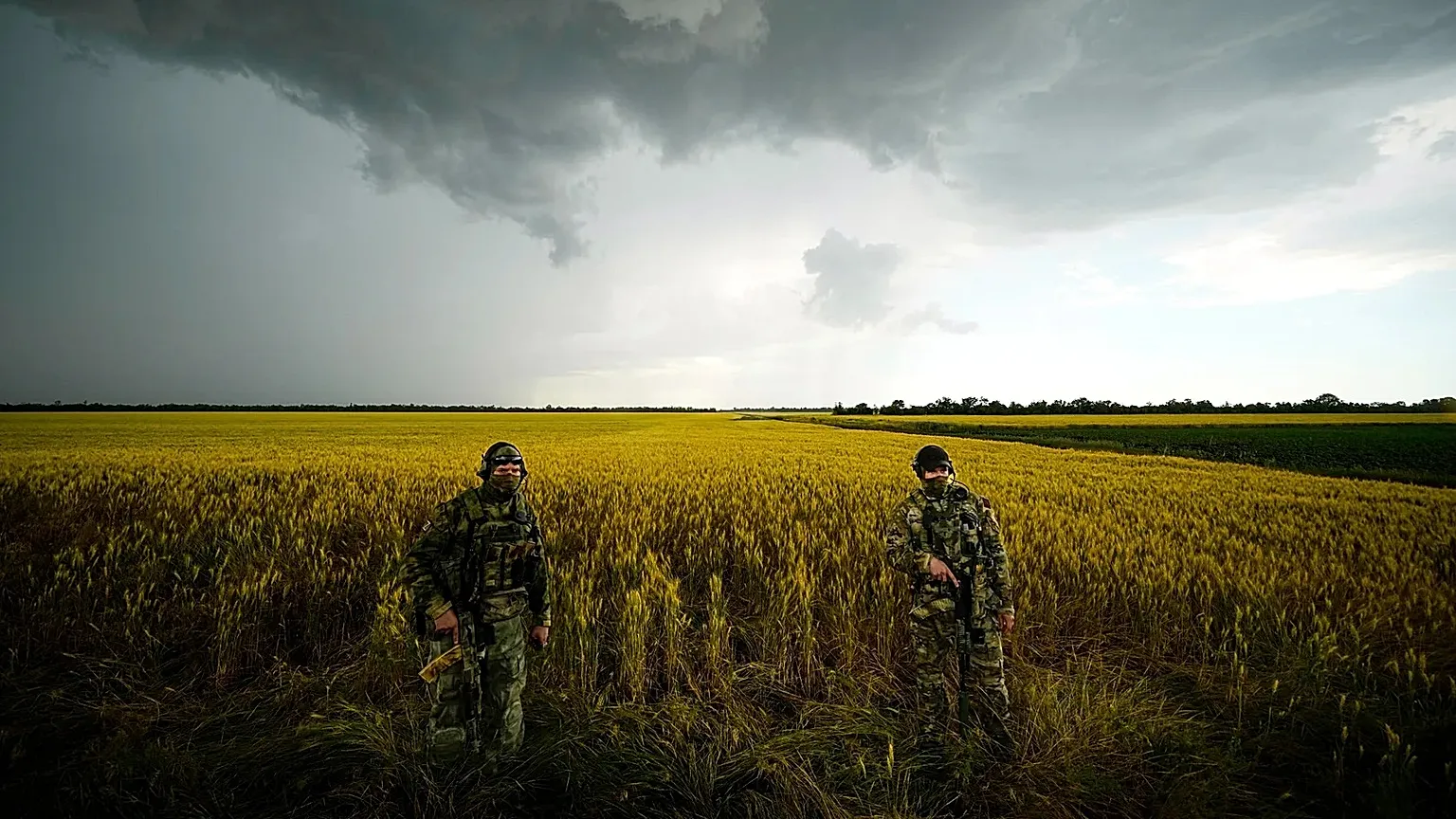FILE - Russian soldiers at am occupied field of wheat in Ukraine’s Zaporizhzhia, southeastern Ukraine, June 14, 2022